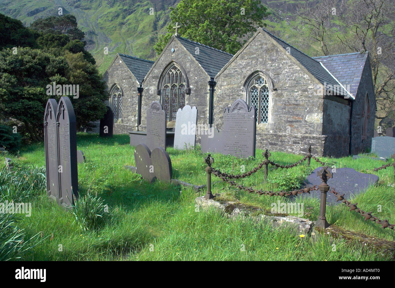 Graves in the churchyard of the church in the village of Nant Peris in Snowdonia Stock Photo