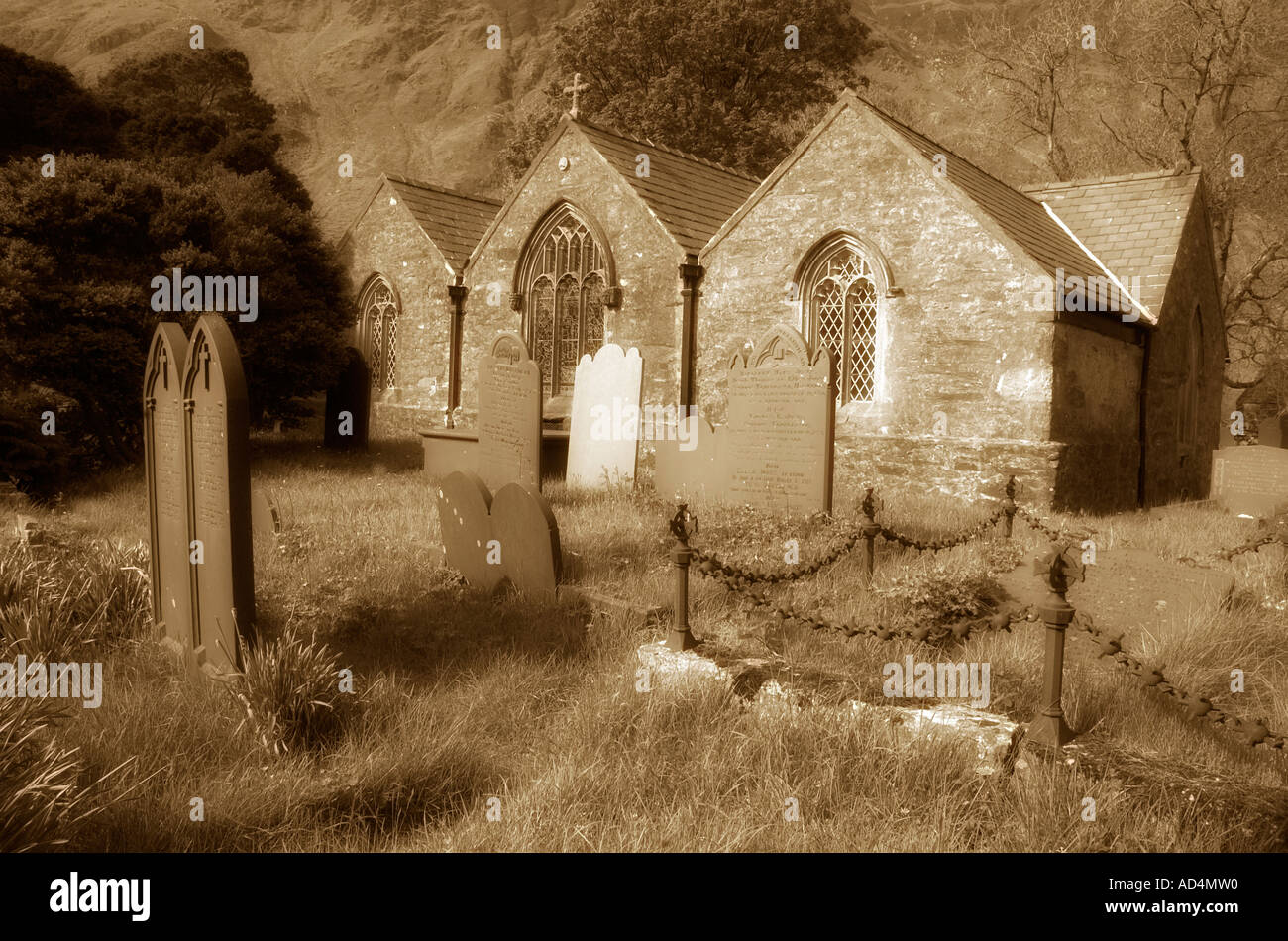 Graves in the churchyard of the church in the village of Nant Peris in Snowdonia Stock Photo