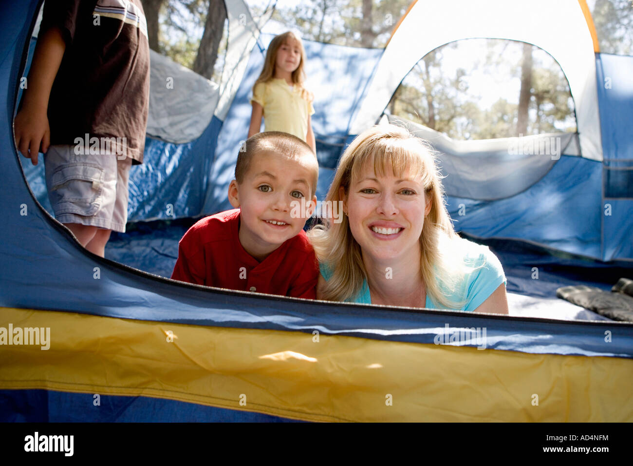 Portrait of a mother and son in a tent Stock Photo