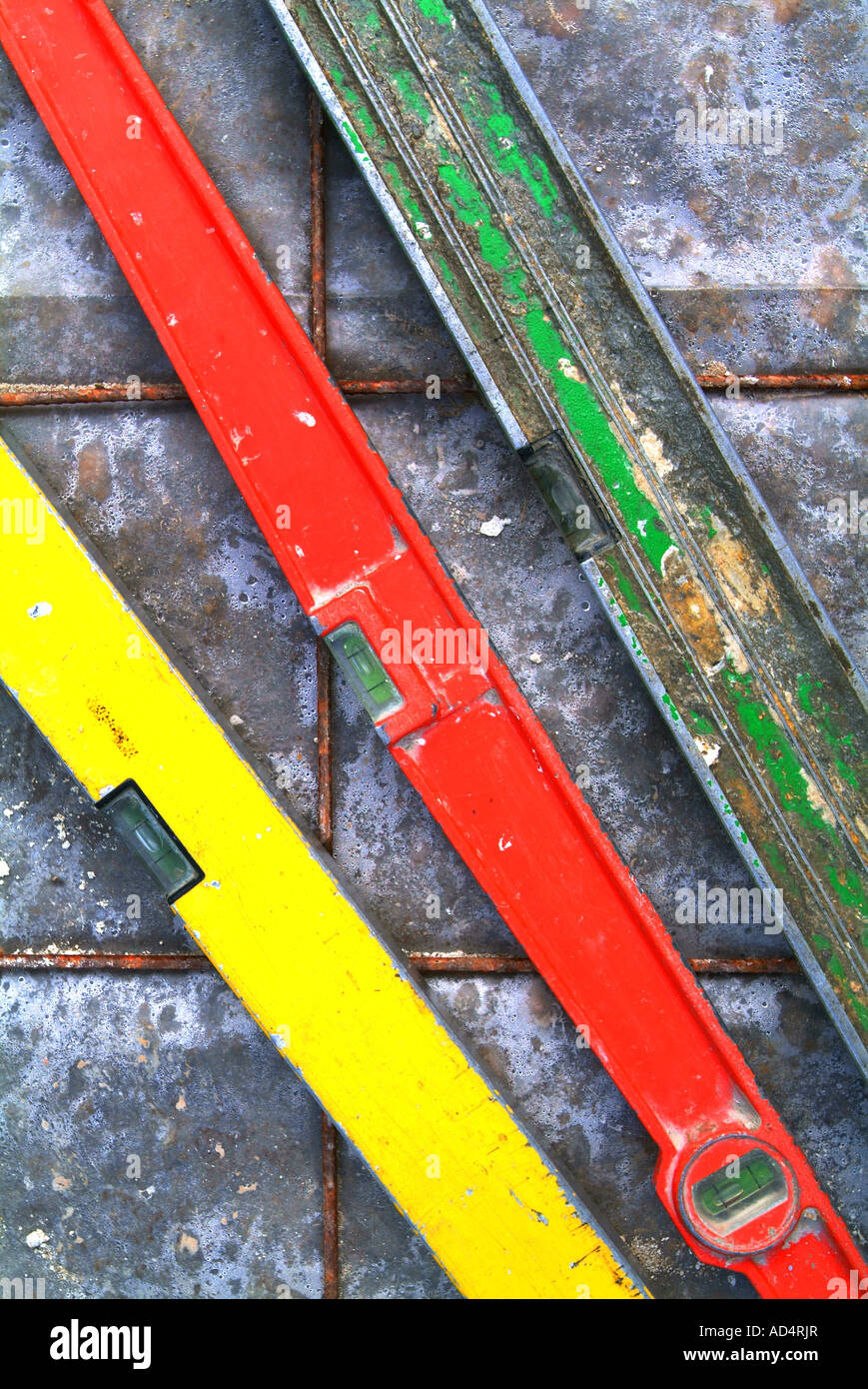 Coloured levels on the tiled floor Stock Photo - Alamy