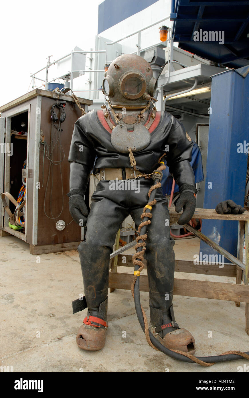 Man in antique brass diving bell Stock Photo Alamy