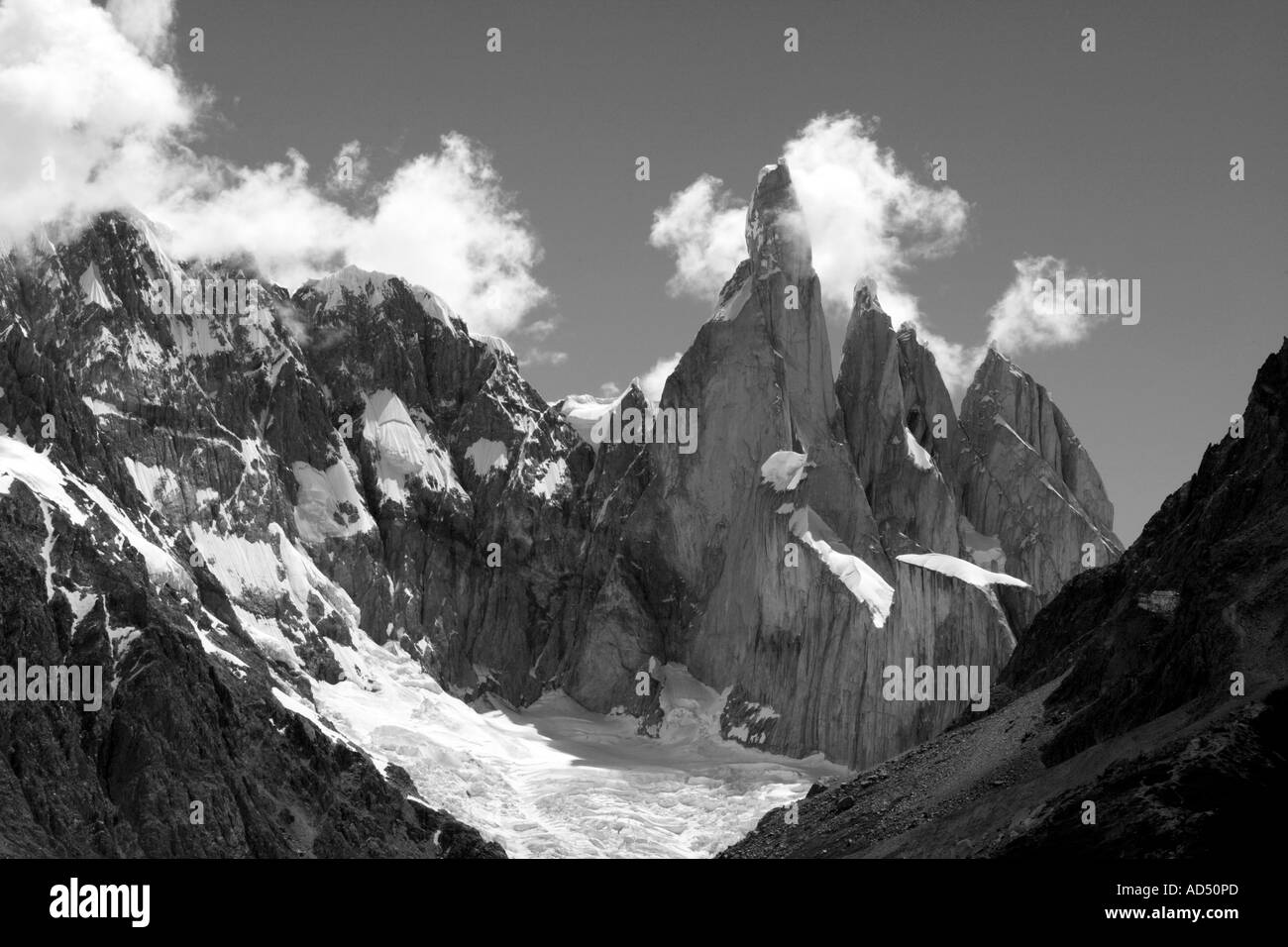 Wisps of clouds on Cerro Torre Stock Photo