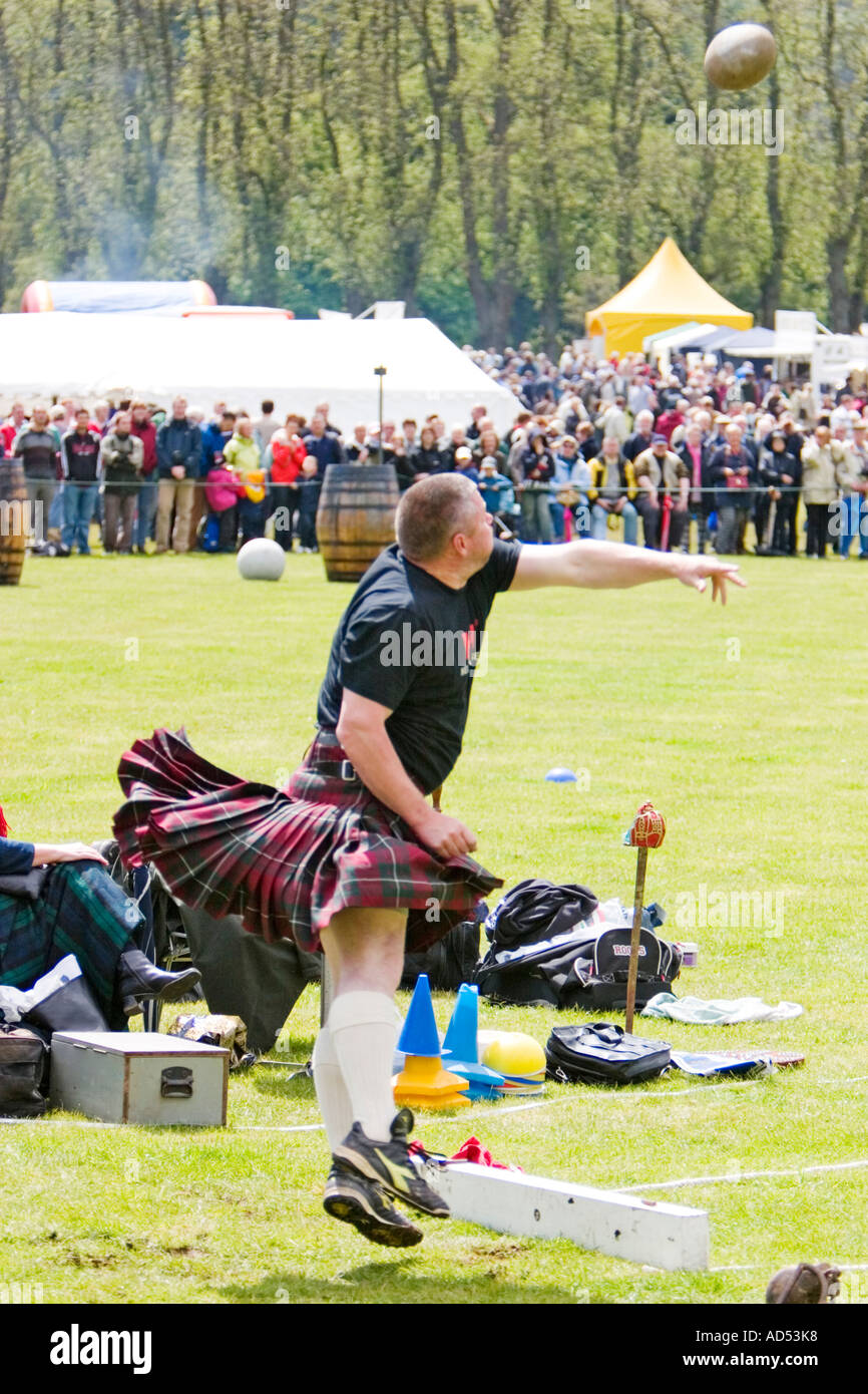 Competitor putting shot put at 2006 Atholl Gathering Highland Games ...