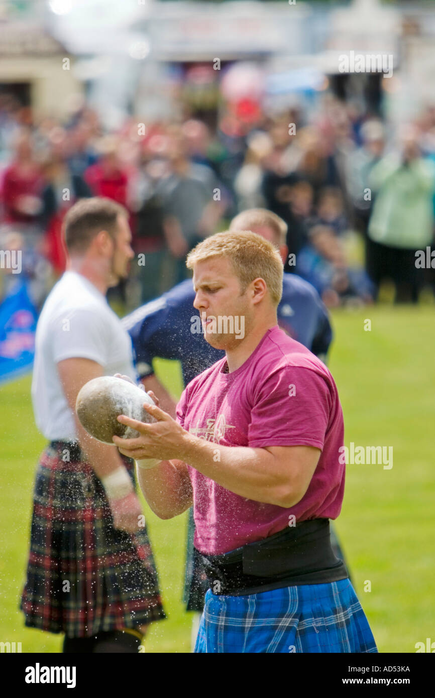 Competitor putting shot put at 2006 Atholl Gathering Highland Games ...