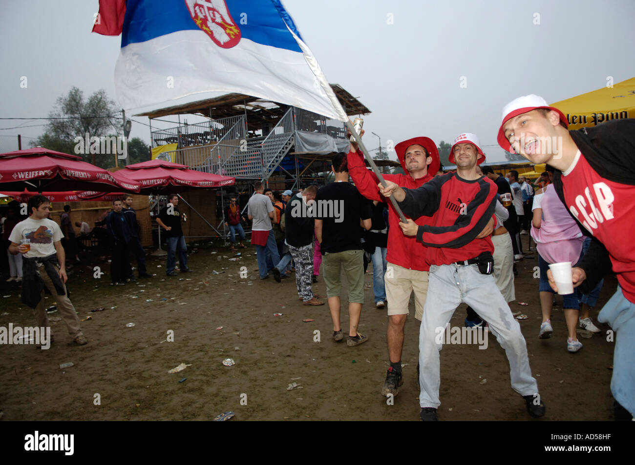 Balkan Brass Bands Music Festival Guca / Serbia 2005, man waving with the Serbian flag Stock Photo
