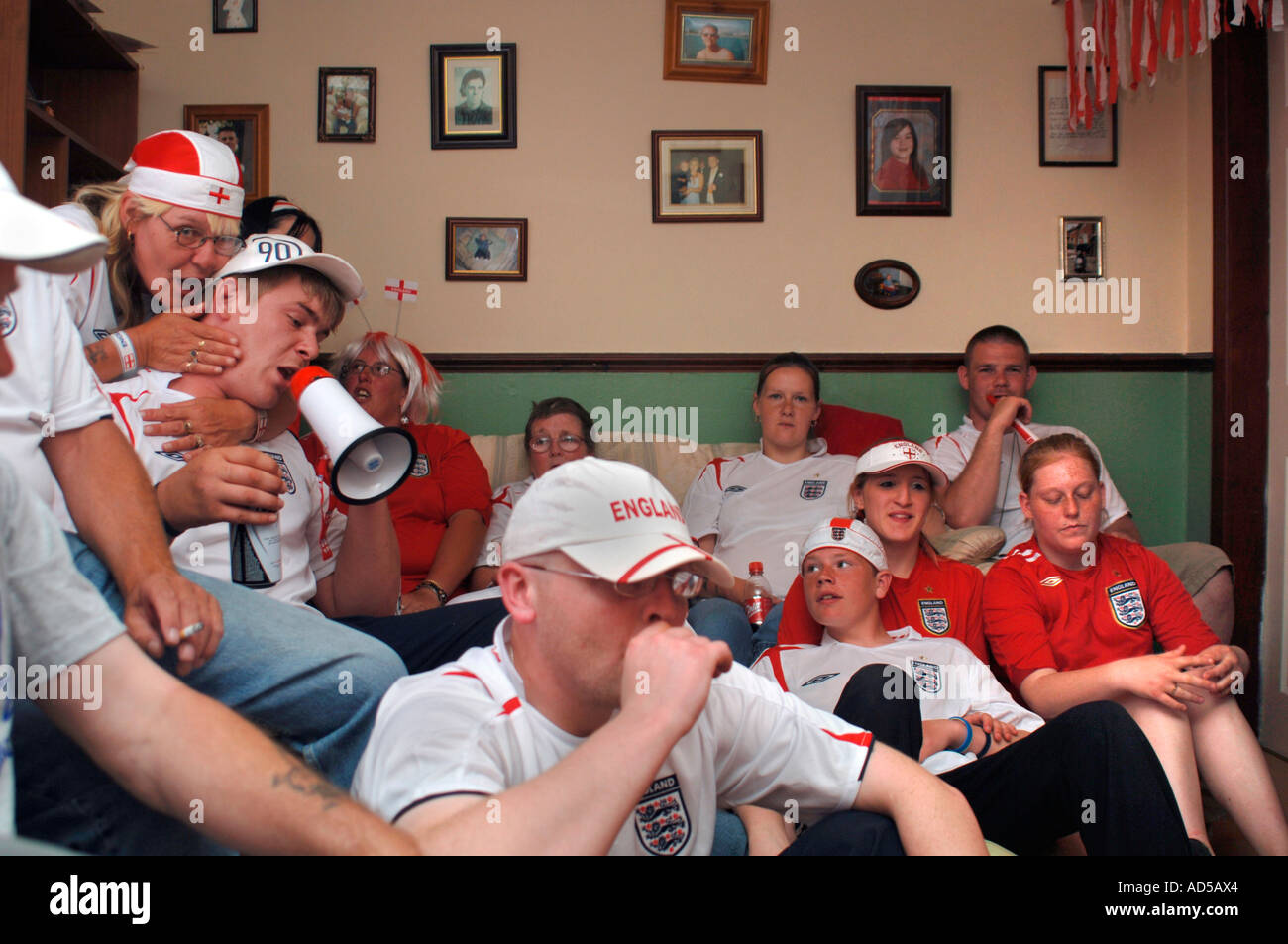 England Football Supporters At Home,Watching Match On TV Stock Photo