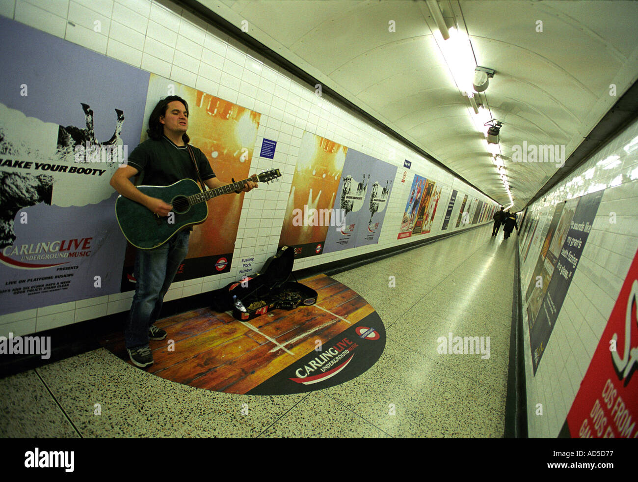 An official busker on the London Underground Britain UK Stock Photo Alamy