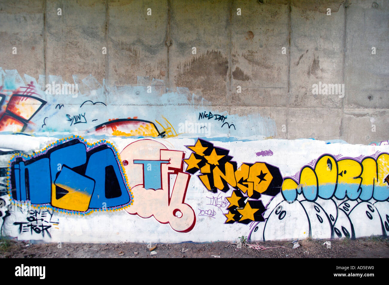 Graffiti on the concrete structure of M4 motorway bridge at Newport South Wales UK Stock Photo