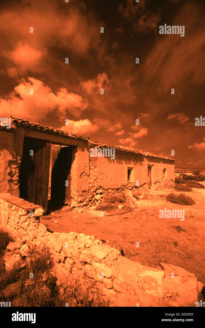 Landscape of abandoned Spanish farmstead shot in infrared. Stock Photo