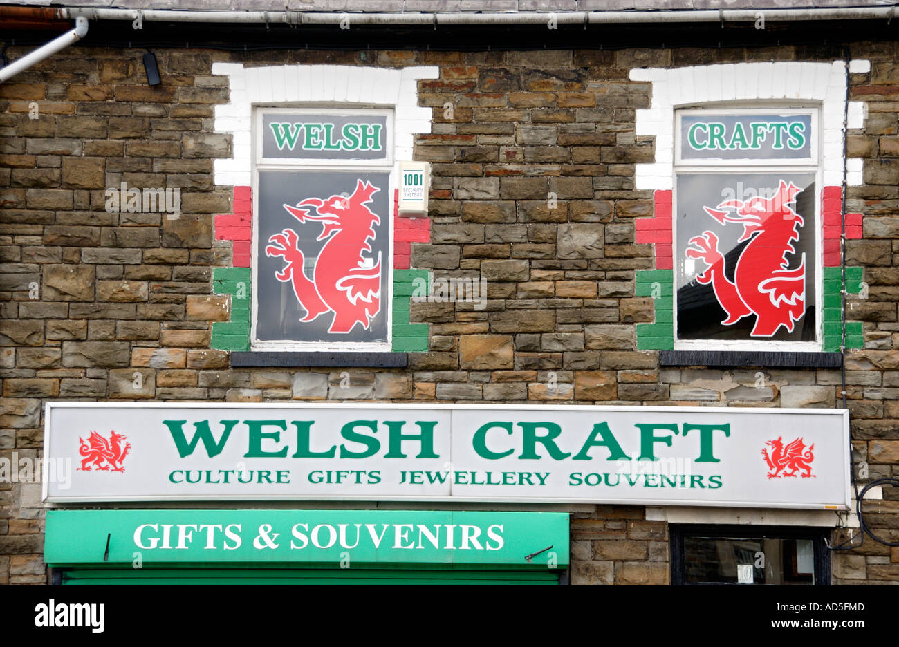 Welsh Craft shop with red dragon painting in windows selling gifts and