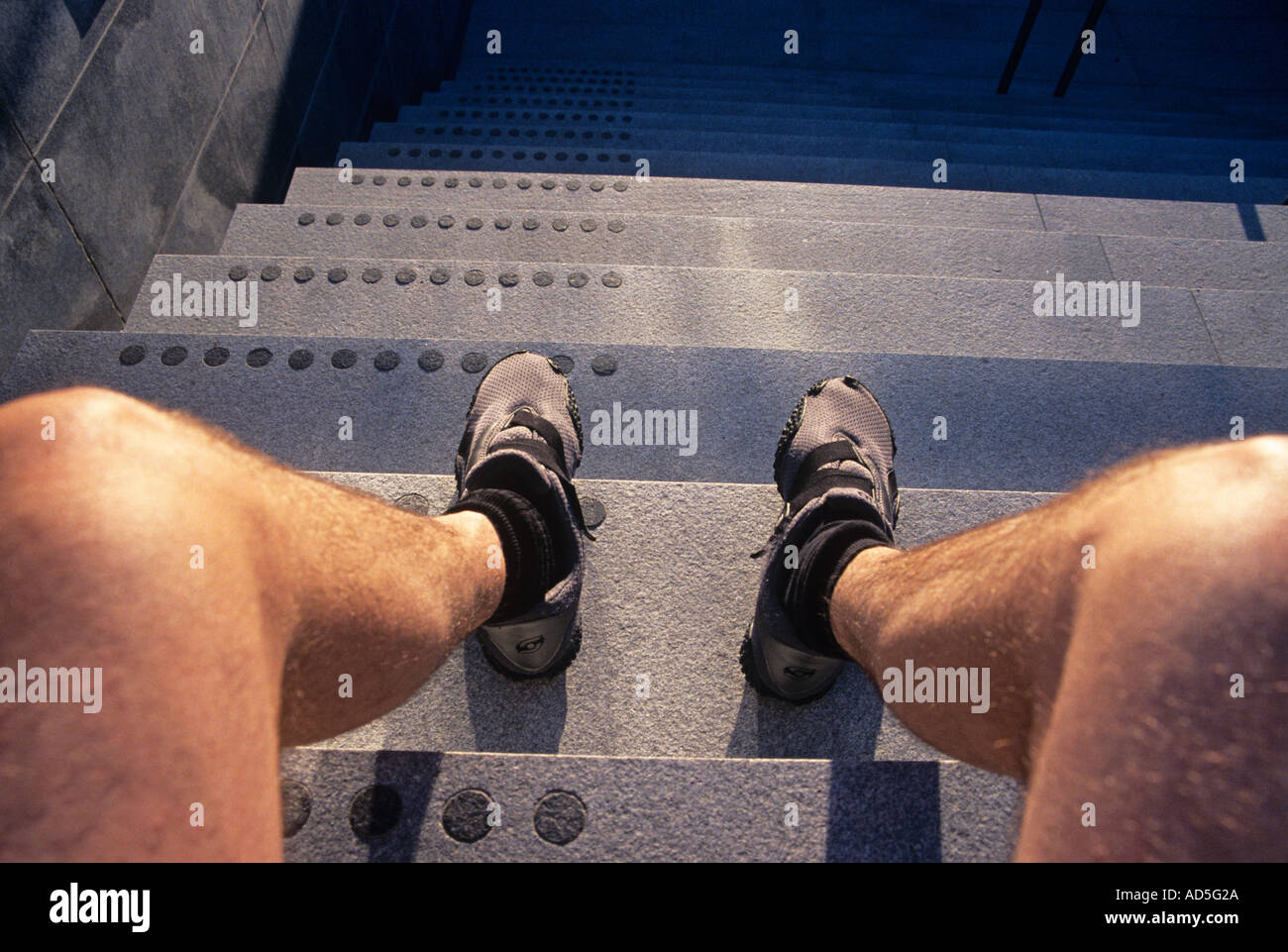 Stairs legs feet man hi-res stock photography and images - Alamy