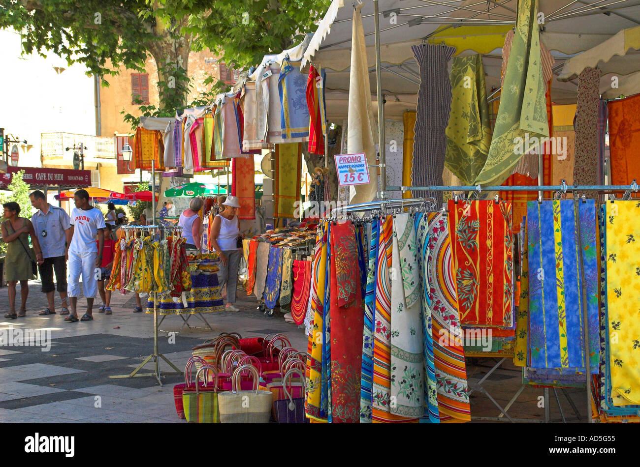 Fabric stalls in Flayosc weekly market Provence Var France  Stock Photo