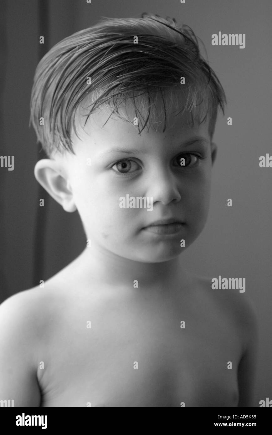 A child s face looking at camera Stock Photo