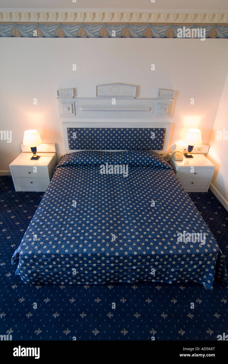 Vertical interior view of a hotel double room ready for occupancy Stock