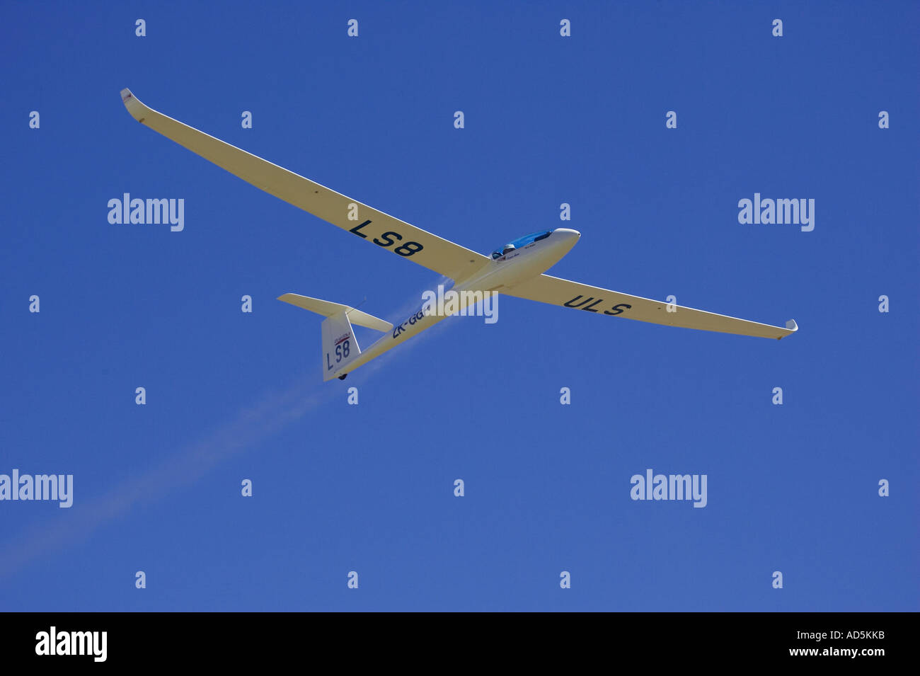 Glider dropping water ballast Omarama South Island New Zealand Stock