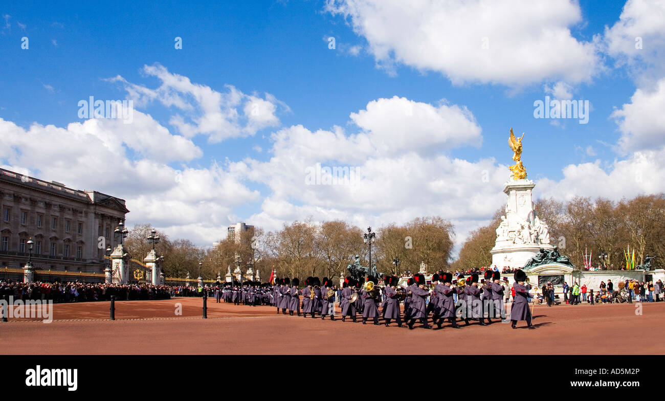 The Coldstream Guards Regiment with regimental band playing music Changing of The Guard ceremony at Buckingham Palace London Stock Photo