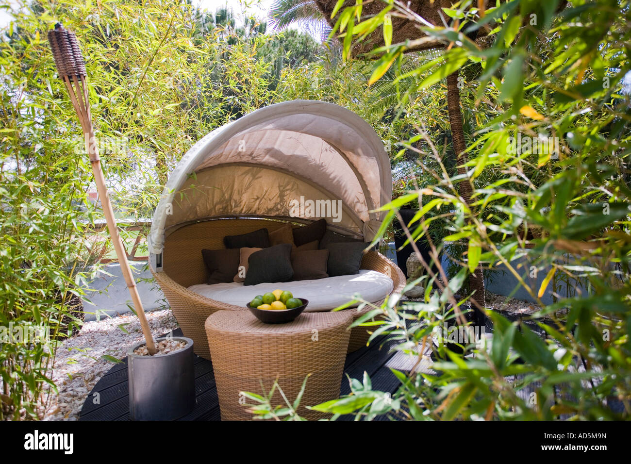 Circular wicker garden bed with adjustable hood Stock Photo Alamy