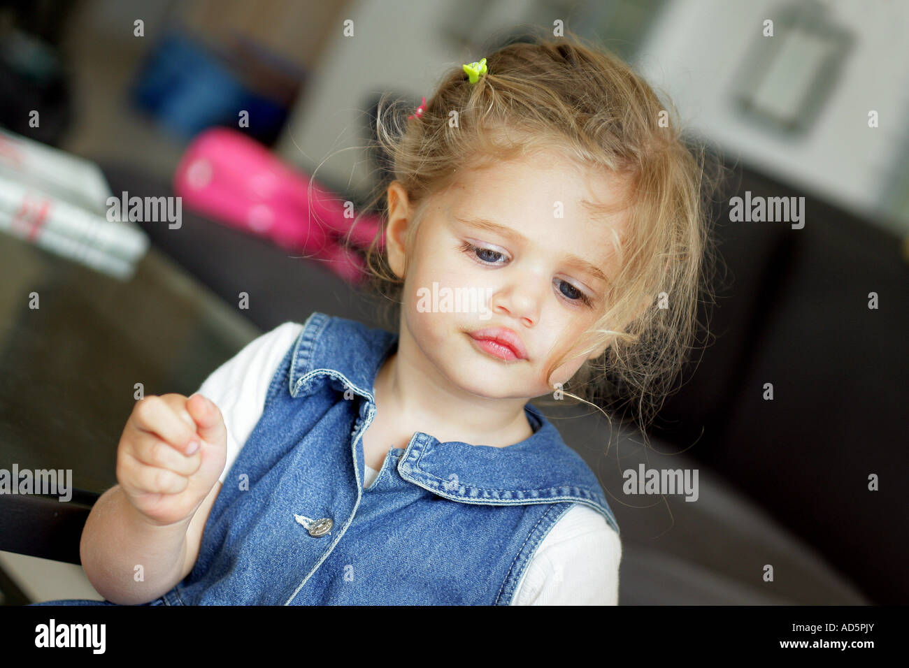 Little girl in living room Stock Photo - Alamy