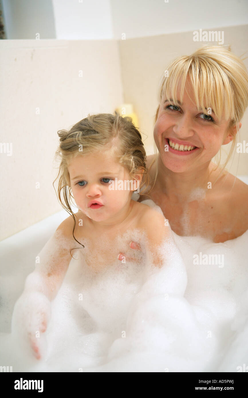 Mother and child taking a bath Stock Photo Alamy