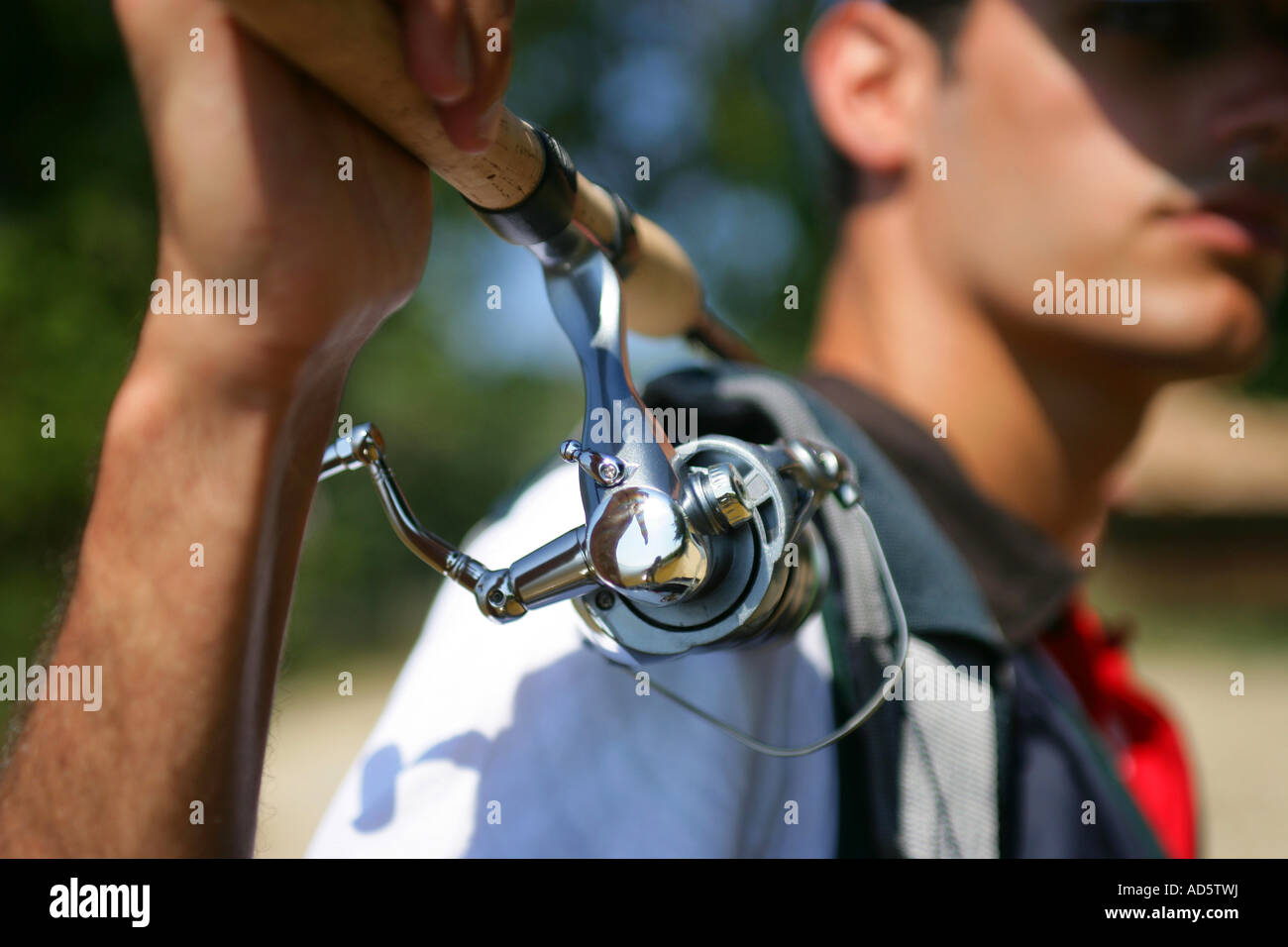 Teen Girl (15-17) at Pond, Holding Fishing Rod and Reel Stock