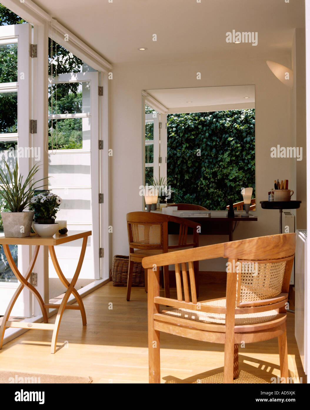 Wooden Armchair And Small Table On Wooden Floor In Modern White Stock Photo Alamy