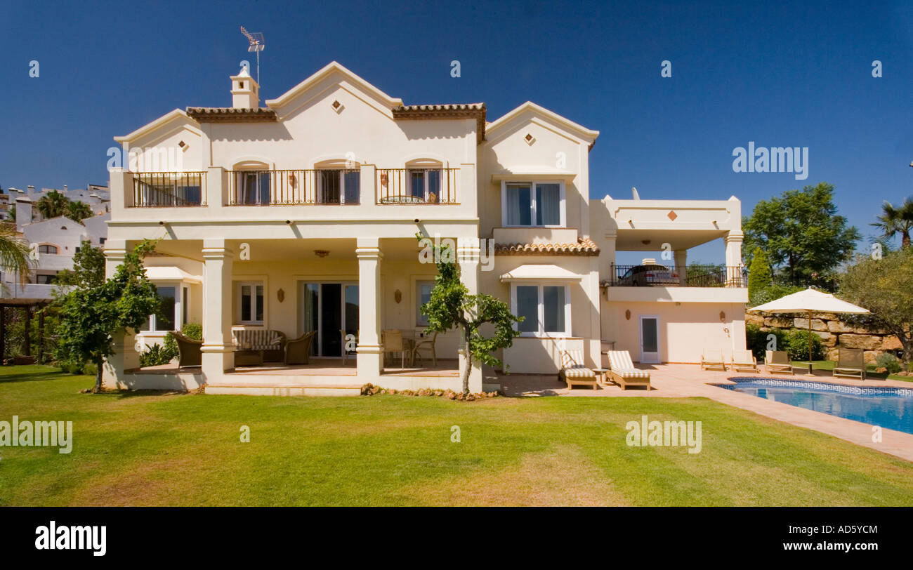 Large white Spanish villa with balcony over veranda Stock Photo Alamy
