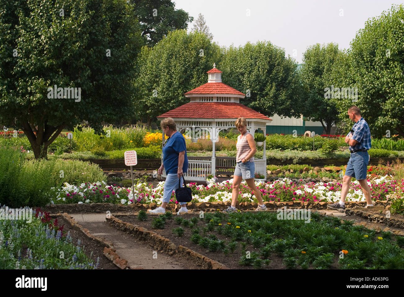 ILLINOIS Arcola Visitors walk along brick pathways between flower beds