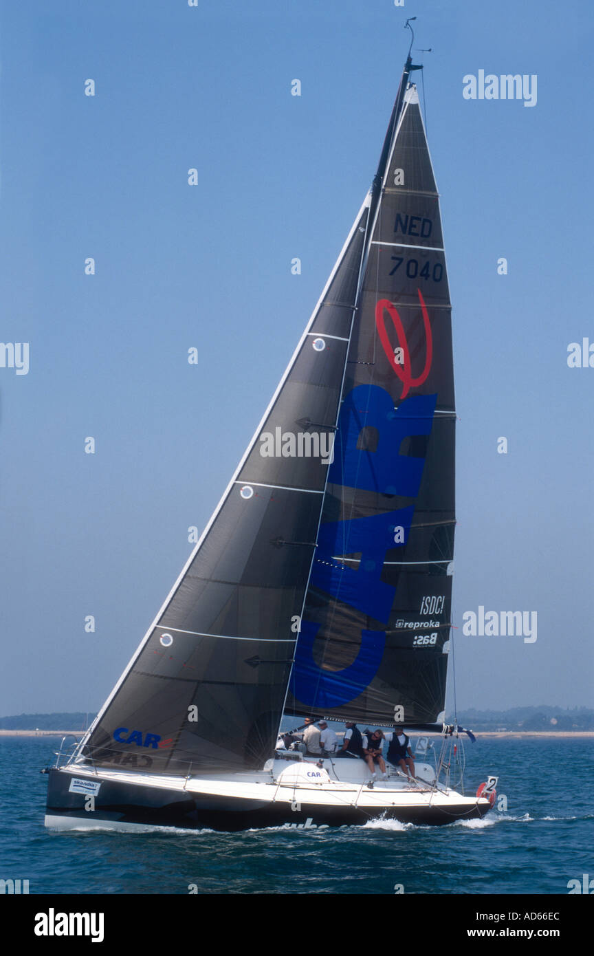 A yacht racing off the Isle of Wight Hampshire England during Cowes Week Stock Photo
