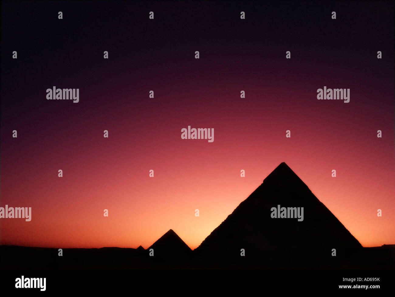 pyramids silhouetted by sunset afterglow, Cairo, Egypt Stock Photo - Alamy