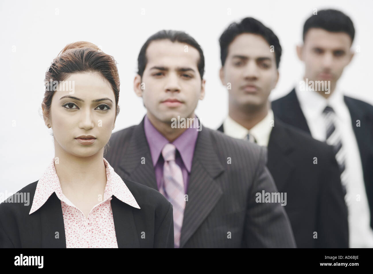 Executives standing in a row hi-res stock photography and images - Alamy