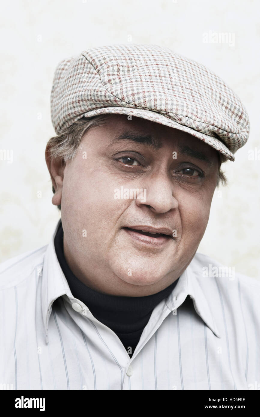 Indian man wearing cap in hi-res stock photography and images - Alamy