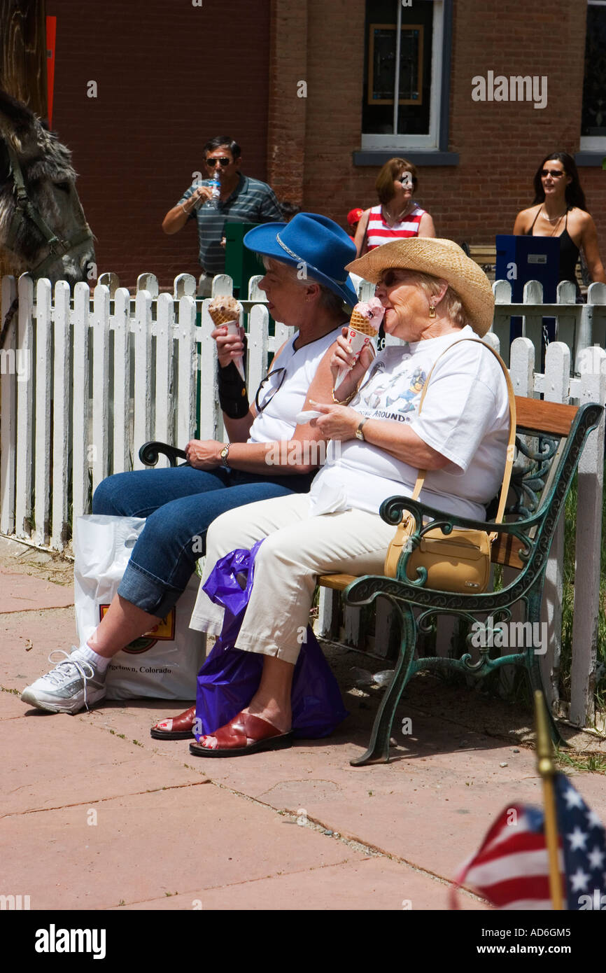 Elderly women enjoying ice cream in Colorado USA June 2006