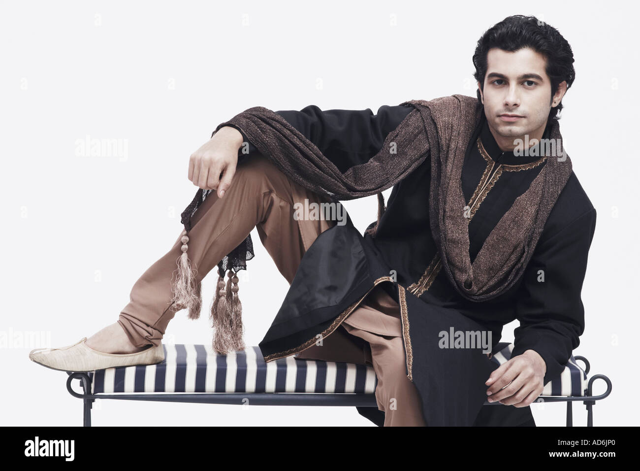 Man sitting studio shot bench hi-res stock photography and images - Alamy