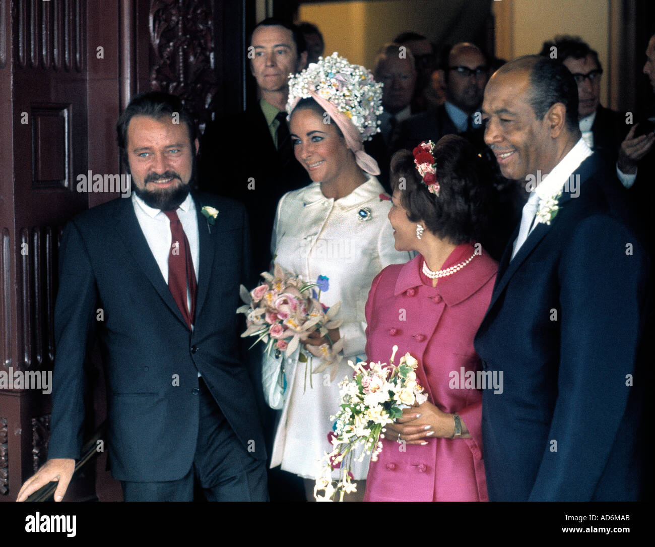 Actress Elizabeth Taylor and actor Richard Burton attend wedding of Robert  Wilson and Gladys Mills at Caxton Hall London in 1969 Stock Photo - Alamy