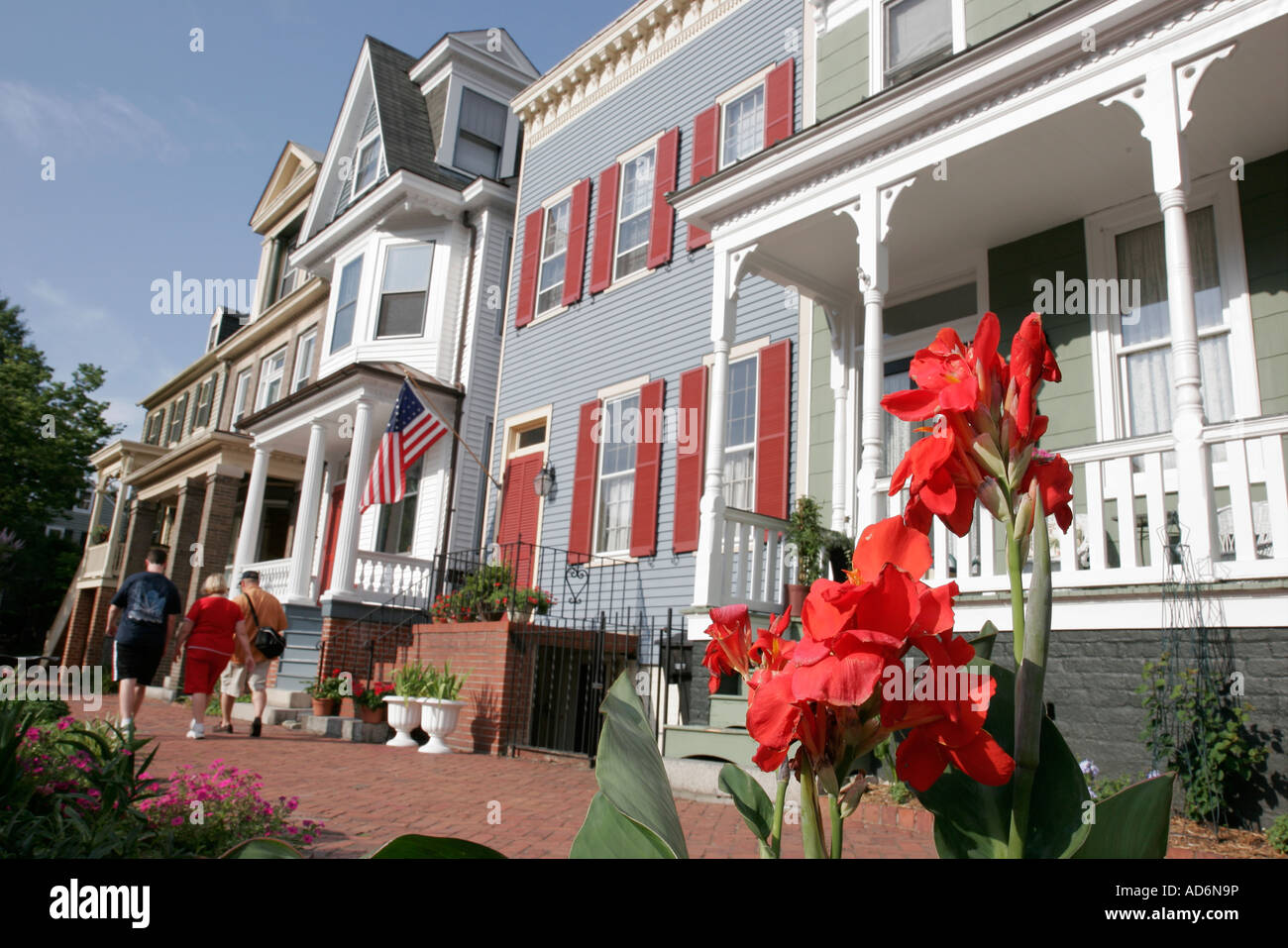 Portsmouth Virginia,Court Street,Olde Towne Historic District,flower flowers,flower flowers,porch,steps stairs staircase,flag,family families parent p Stock Photo