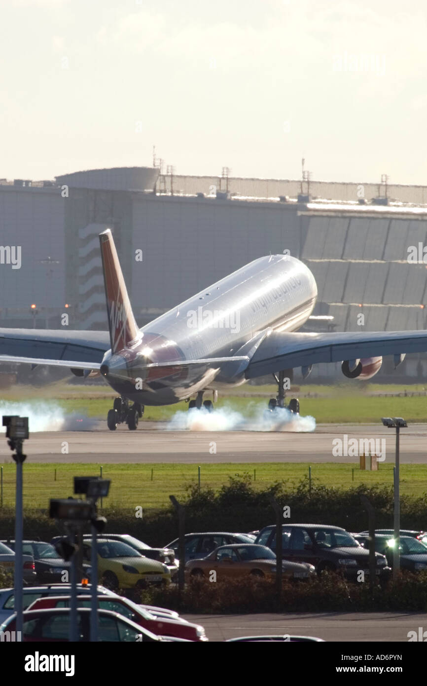 Airliner landing at London Heathrow Airport England UK Stock Photo