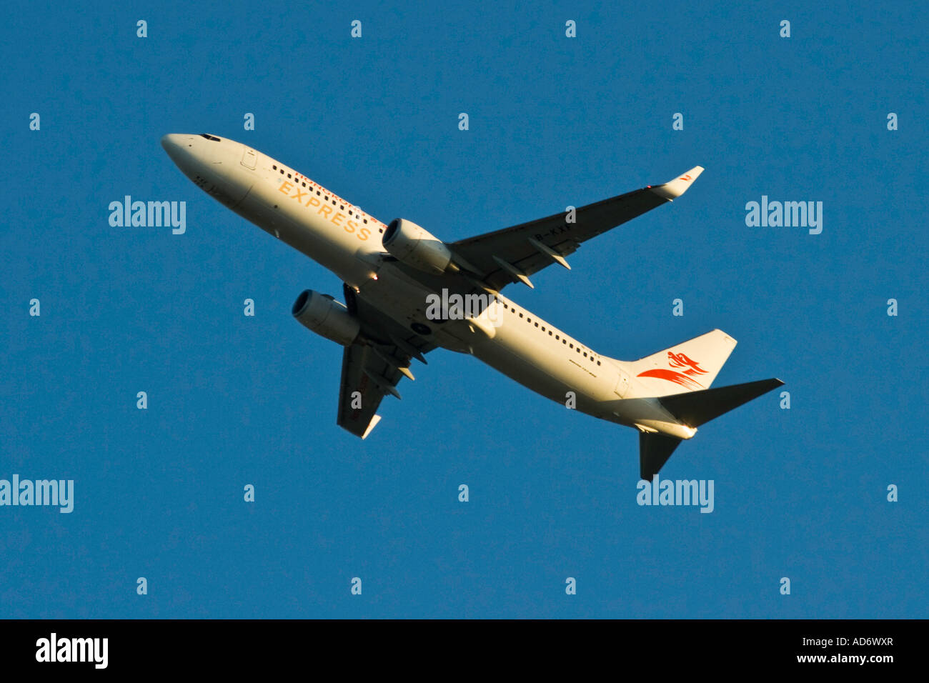 Hong Kong Express Airways Limited Boeing 737 Airplane in Flight just after Takeoff Stock Photo