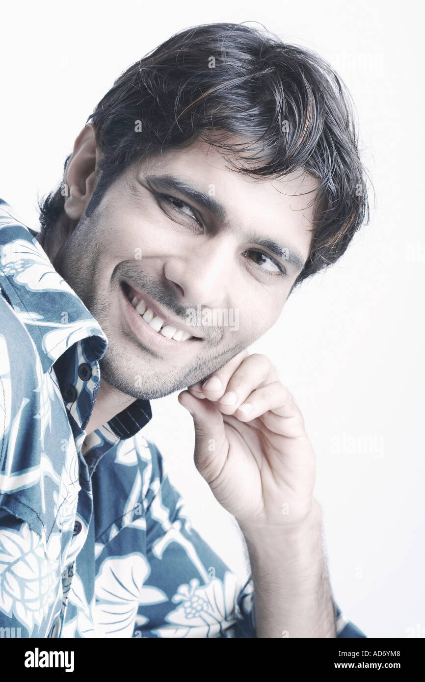 Portrait of a young man smiling Stock Photo - Alamy