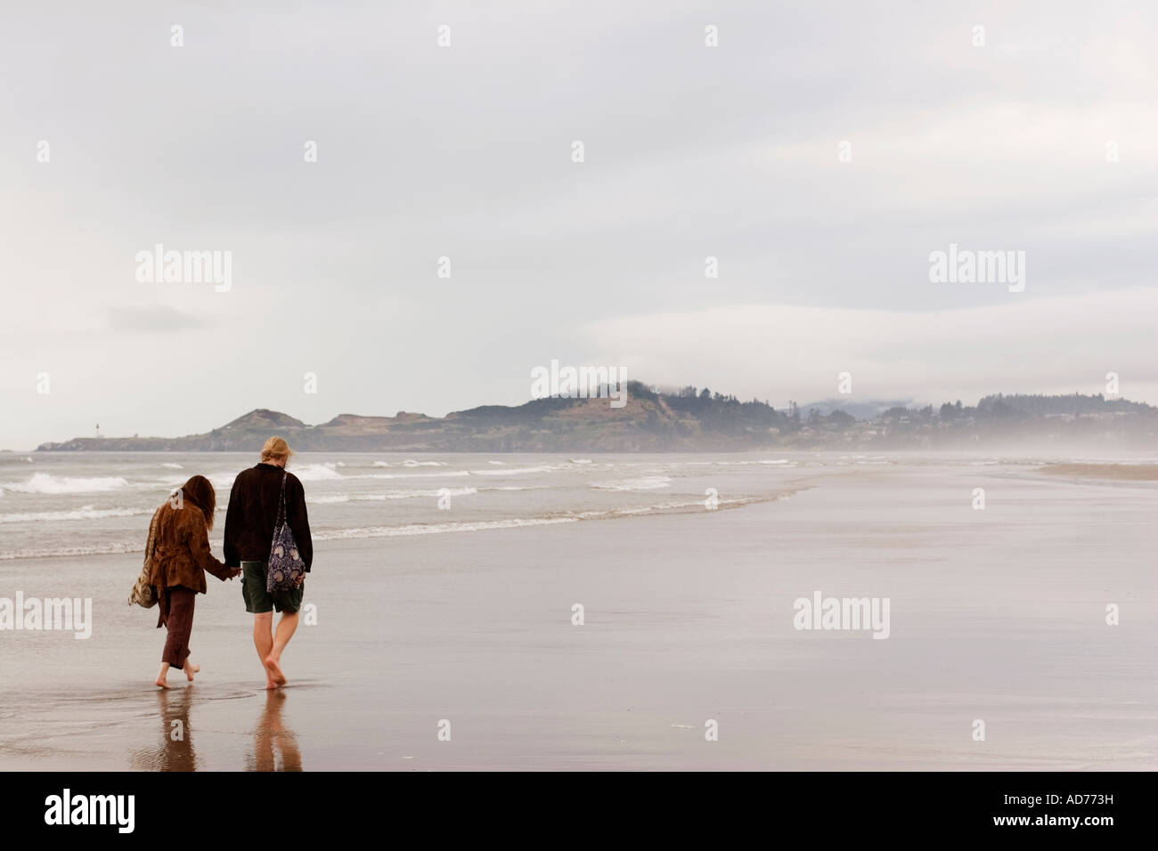 Holding hands walking apart hi-res stock photography and images - Alamy
