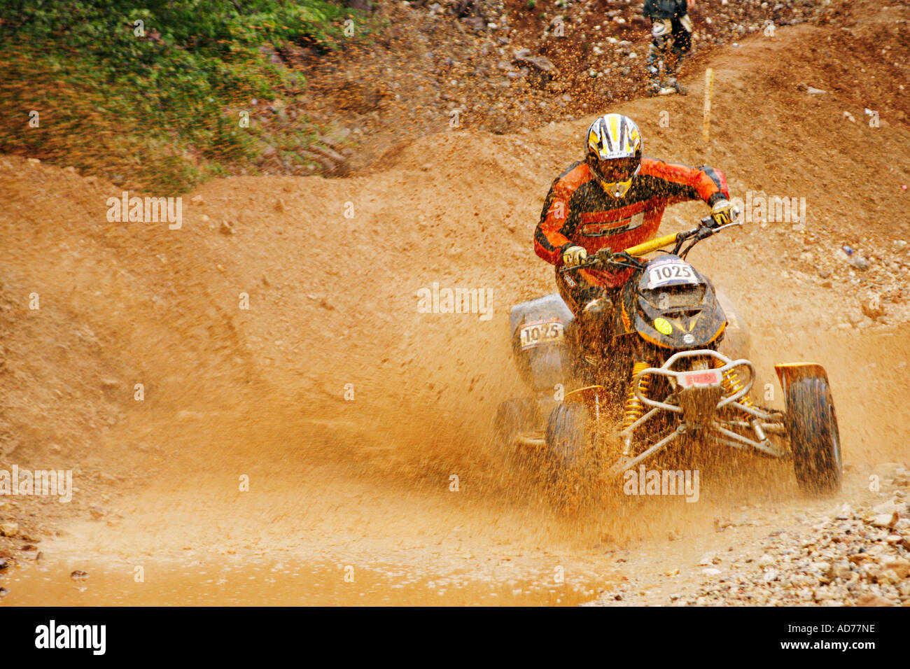 Quad driver in the dirt Stock Photo