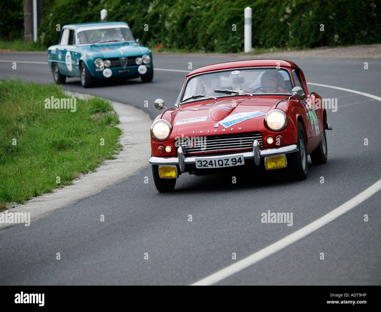 Triumph GT6 and Alfa Romeo Giulia in the Boucles de Loire classic car rallye july 2007 Loire Valley France Stock Photo