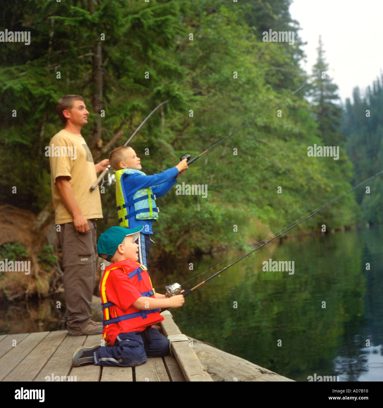 Boys fishing dock hi-res stock photography and images - Alamy