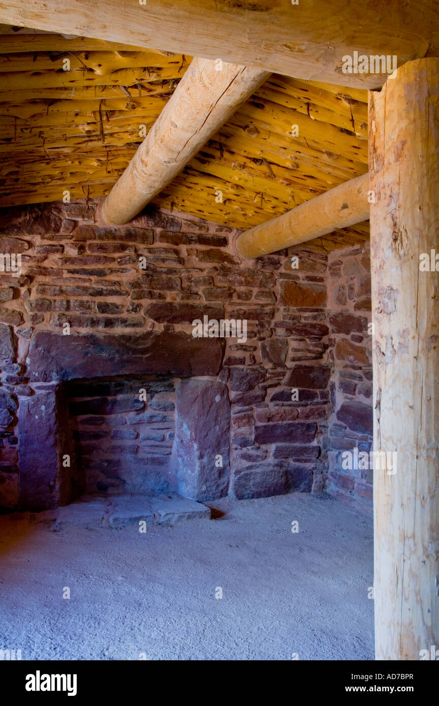 Stone Wall Fireplace And Wood Beam Ceiling At East Cabin Pipe