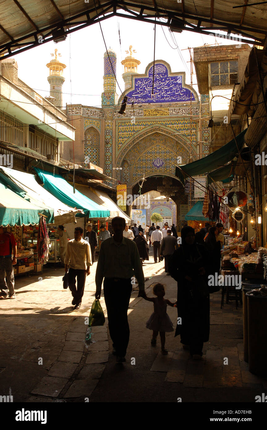 Small girl going to the Old bazaar of Shahreh Rey with Mum and Dad in Tehran Stock Photo
