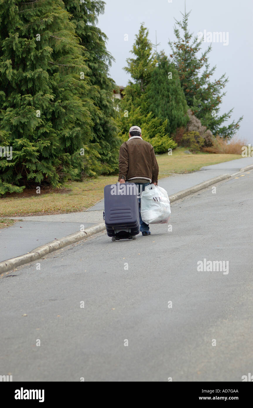 Woman walking up steep hill hires stock photography and images Alamy