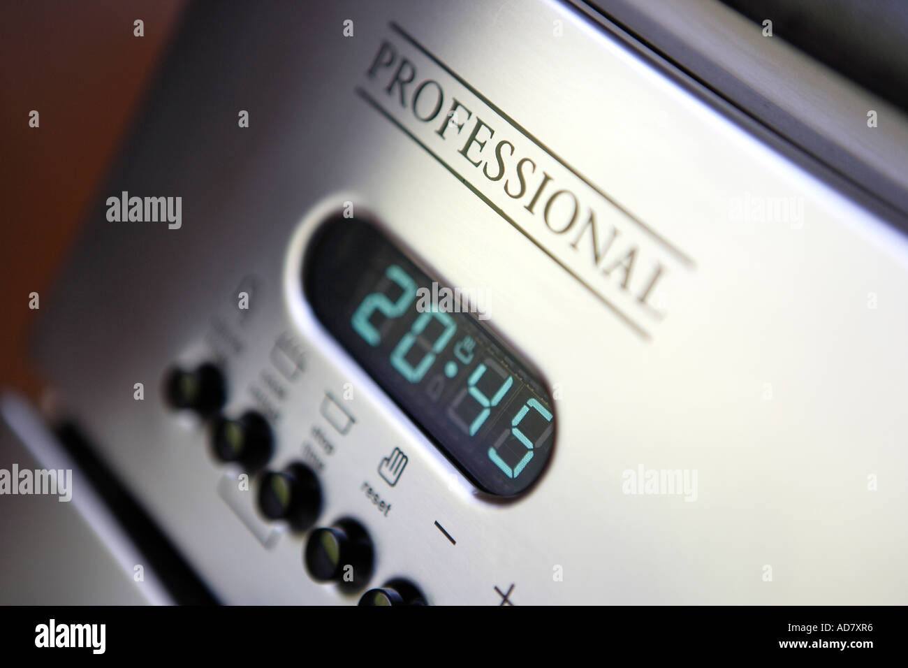 Digital clock on oven Stock Photo Alamy