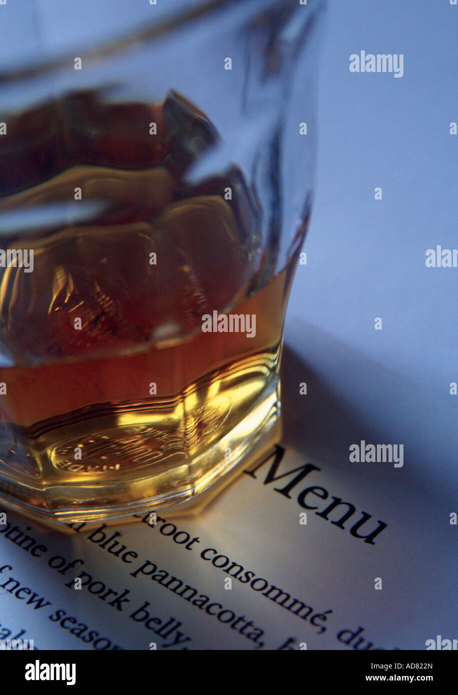 Glass of whisky on a restaurant menu Stock Photo