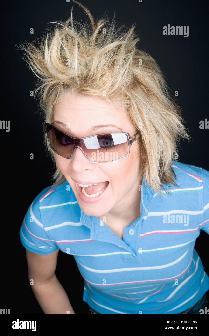 Funky blonde with sunglasses Stock Photo