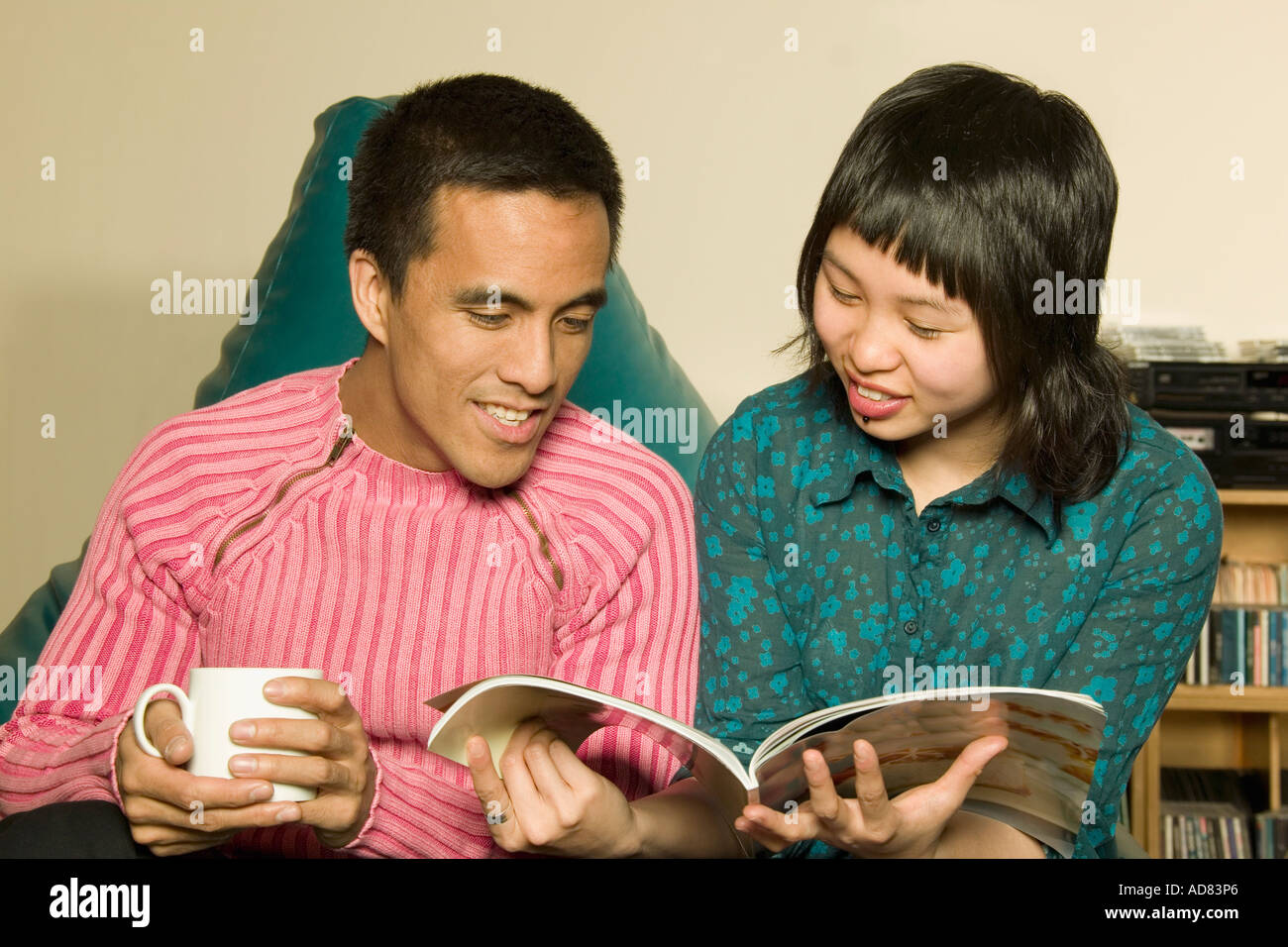 Read Twogether Couple reading together Stock Photo - Alamy