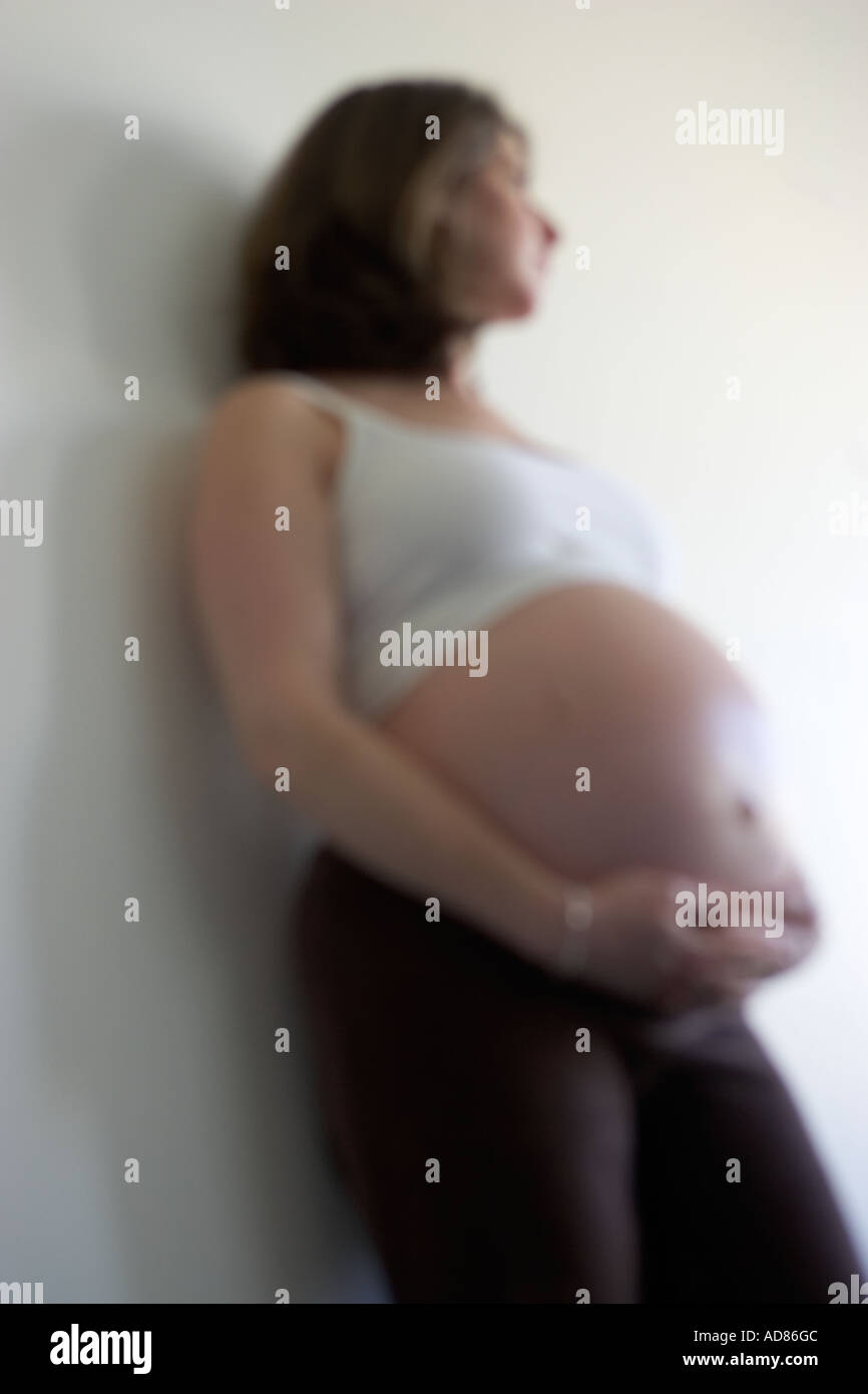 Pregnant Woman Meditating Stock Photo
